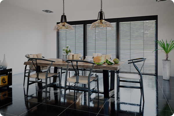 dining room with pendant lights over table